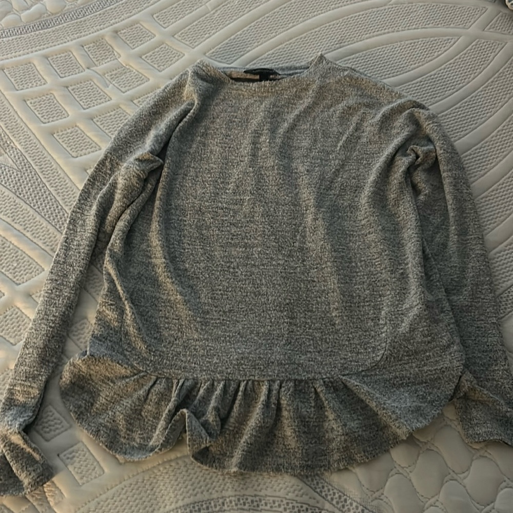 Banana Republic ruffle bottom long sleeve top.